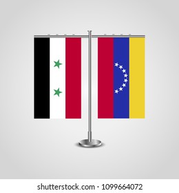 Table stand with flags of Syria and Venezuela.Two flag. Flag pole. Symbolizing the cooperation between the two countries. Table flags