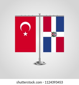 Table stand with flags of Turkey and Dominican Republic.Two flag. Flag pole. Symbolizing the cooperation between the two countries. Table flags
