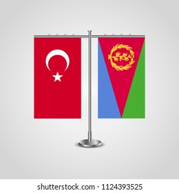 Table stand with flags of Turkey and Eritrea.Two flag. Flag pole. Symbolizing the cooperation between the two countries. Table flags