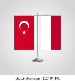 Table stand with flags of Turkey and Indonesia.Two flag. Flag pole. Symbolizing the cooperation between the two countries. Table flags
