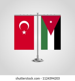 Table stand with flags of Turkey and Jordan.Two flag. Flag pole. Symbolizing the cooperation between the two countries. Table flags