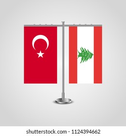 Table stand with flags of Turkey and Lebanon.Two flag. Flag pole. Symbolizing the cooperation between the two countries. Table flags