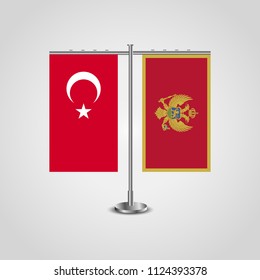 Table stand with flags of Turkey and Montenegro.Two flag. Flag pole. Symbolizing the cooperation between the two countries. Table flags