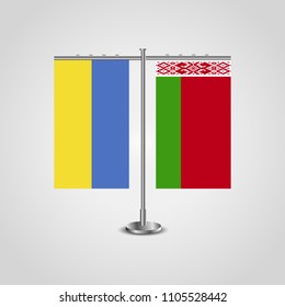 Table stand with flags of Ukraine and Belarus.Two flag. Flag pole. Symbolizing the cooperation between the two countries. Table flags