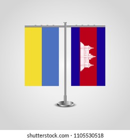 Table stand with flags of Ukraine and Cambodia.Two flag. Flag pole. Symbolizing the cooperation between the two countries. Table flags
