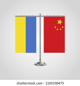 Table stand with flags of Ukraine and China.Two flag. Flag pole. Symbolizing the cooperation between the two countries. Table flags