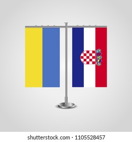 Table stand with flags of Ukraine and Croatia.Two flag. Flag pole. Symbolizing the cooperation between the two countries. Table flags