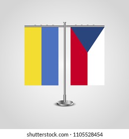 Table stand with flags of Ukraine and  Czech Republic.Two flag. Flag pole. Symbolizing the cooperation between the two countries. Table flags