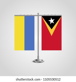 Table stand with flags of Ukraine and East Timor.Two flag. Flag pole. Symbolizing the cooperation between the two countries. Table flags