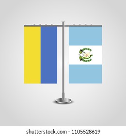 Table stand with flags of Ukraine and Guatemala.Two flag. Flag pole. Symbolizing the cooperation between the two countries. Table flags