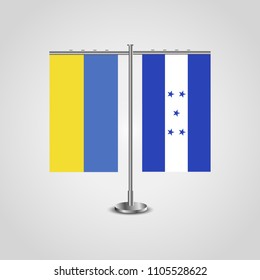 Table stand with flags of Ukraine and Honduras.Two flag. Flag pole. Symbolizing the cooperation between the two countries. Table flags