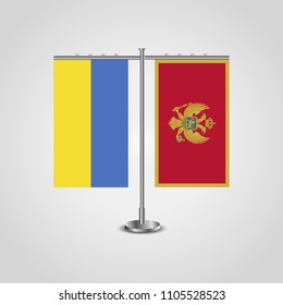 Table stand with flags of Ukraine and Montenegro.Two flag. Flag pole. Symbolizing the cooperation between the two countries. Table flags