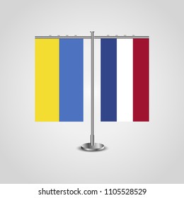 Table stand with flags of Ukraine and Netherlands.Two flag. Flag pole. Symbolizing the cooperation between the two countries. Table flags