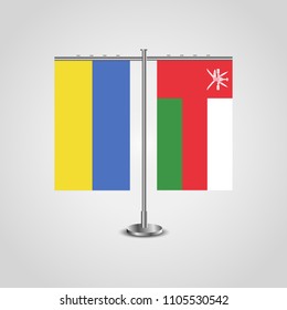 Table stand with flags of Ukraine and Oman.Two flag. Flag pole. Symbolizing the cooperation between the two countries. Table flags