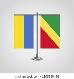 Table stand with flags of Ukraine and Republic of the Congo.Two flag. Flag pole. Symbolizing the cooperation between the two countries. Table flags