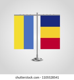 Table stand with flags of Ukraine and Romania.Two flag. Flag pole. Symbolizing the cooperation between the two countries. Table flags