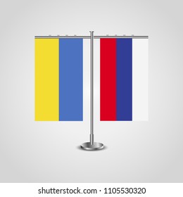 Table stand with flags of Ukraine and Russia.Two flag. Flag pole. Symbolizing the cooperation between the two countries. Table flags