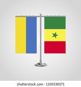 Table stand with flags of Ukraine and Senegal.Two flag. Flag pole. Symbolizing the cooperation between the two countries. Table flags