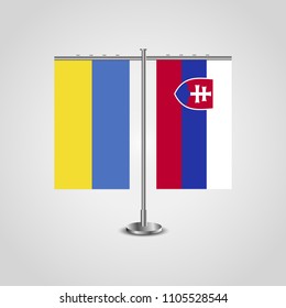 Table stand with flags of Ukraine and Slovakia.Two flag. Flag pole. Symbolizing the cooperation between the two countries. Table flags