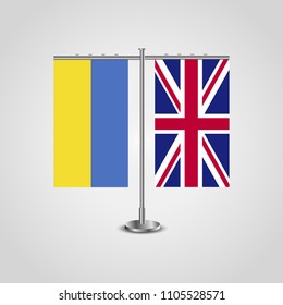 Table stand with flags of Ukraine and United Kingdom.Two flag. Flag pole. Symbolizing the cooperation between the two countries. Table flags