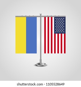 Table stand with flags of Ukraine and USA.Two flag. Flag pole. Symbolizing the cooperation between the two countries. Table flags
