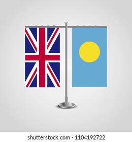 Table stand with flags of United Kingdom and Palau.Two flag. Flag pole. Symbolizing the cooperation between the two countries. Table flags