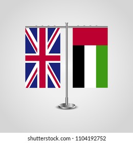 Table stand with flags of United Kingdom and United Arab Emirates.Two flag. Flag pole. Symbolizing the cooperation between the two countries. Table flags