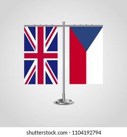 Table stand with flags of United Kingdom and Czech Republic.Two flag. Flag pole. Symbolizing the cooperation between the two countries. Table flags