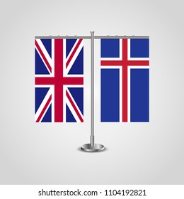 Table stand with flags of United Kingdom and Iceland.Two flag. Flag pole. Symbolizing the cooperation between the two countries. Table flags