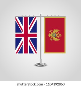 Table stand with flags of United Kingdom and Montenegro.Two flag. Flag pole. Symbolizing the cooperation between the two countries. Table flags
