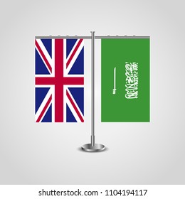 Table stand with flags of United Kingdom and Saudi Arabia.Two flag. Flag pole. Symbolizing the cooperation between the two countries. Table flags