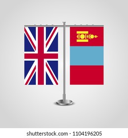 Table stand with flags of United Kingdom and Mongolia.Two flag. Flag pole. Symbolizing the cooperation between the two countries. Table flags