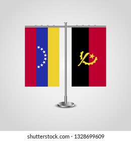 Table stand with flags of Venezuela and Angola. Two flag. Flag pole. Symbolizing the cooperation between the two countries. Table flags
