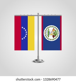 Table stand with flags of Venezuela and Belize. Two flag. Flag pole. Symbolizing the cooperation between the two countries. Table flags

