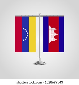 Table stand with flags of Venezuela and Cambodia. Two flag. Flag pole. Symbolizing the cooperation between the two countries. Table flags

