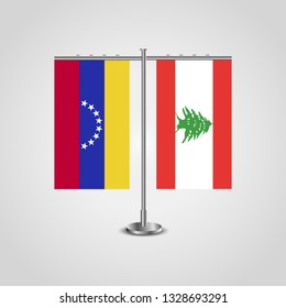 Table stand with flags of Venezuela and Lebanon. Two flag. Flag pole. Symbolizing the cooperation between the two countries. Table flags