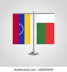 Table stand with flags of Venezuela and Madagascar. Two flag. Flag pole. Symbolizing the cooperation between the two countries. Table flags