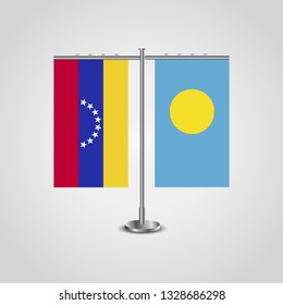 Table stand with flags of Venezuela and Palau. Two flag. Flag pole. Symbolizing the cooperation between the two countries. Table flags