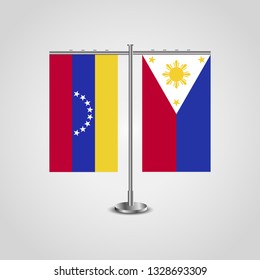 Table stand with flags of Venezuela and Philippines. Two flag. Flag pole. Symbolizing the cooperation between the two countries. Table flags

