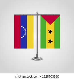 Table stand with flags of Venezuela and Sao Tome and Principe. Two flag. Flag pole. Symbolizing the cooperation between the two countries. Table flags