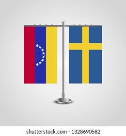 Table stand with flags of Venezuela and Sweden. Two flag. Flag pole. Symbolizing the cooperation between the two countries. Table flags