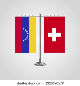 Table stand with flags of Venezuela and Switzerland. Two flag. Flag pole. Symbolizing the cooperation between the two countries. Table flags

