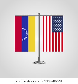 Table stand with flags of Venezuela and USA. Two flag. Flag pole. Symbolizing the cooperation between the two countries. Table flags

