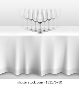 table with a tablecloth glasses