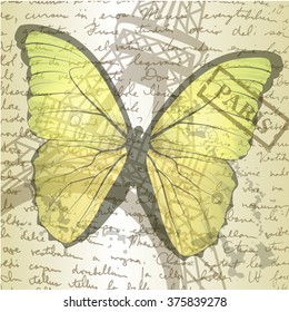 table top with sketching paper and butterfly