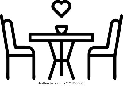 Una mesa con dos sillas. Un símbolo de corazón se coloca encima de la mesa. 