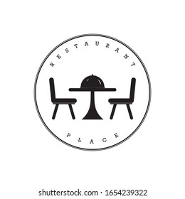 Tables, chairs and food serving caps, in the vintage logo of a restaurant.