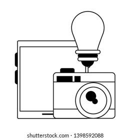 tablet with camera and light bulb in black and white