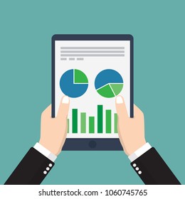 The tablet with charts and graphs business reports hold in hand businessman. Vector illustration flat design. Isolated on background.