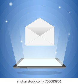 Tablet computer with holographic message icon in its light. Concept for new mobile technologies and communication